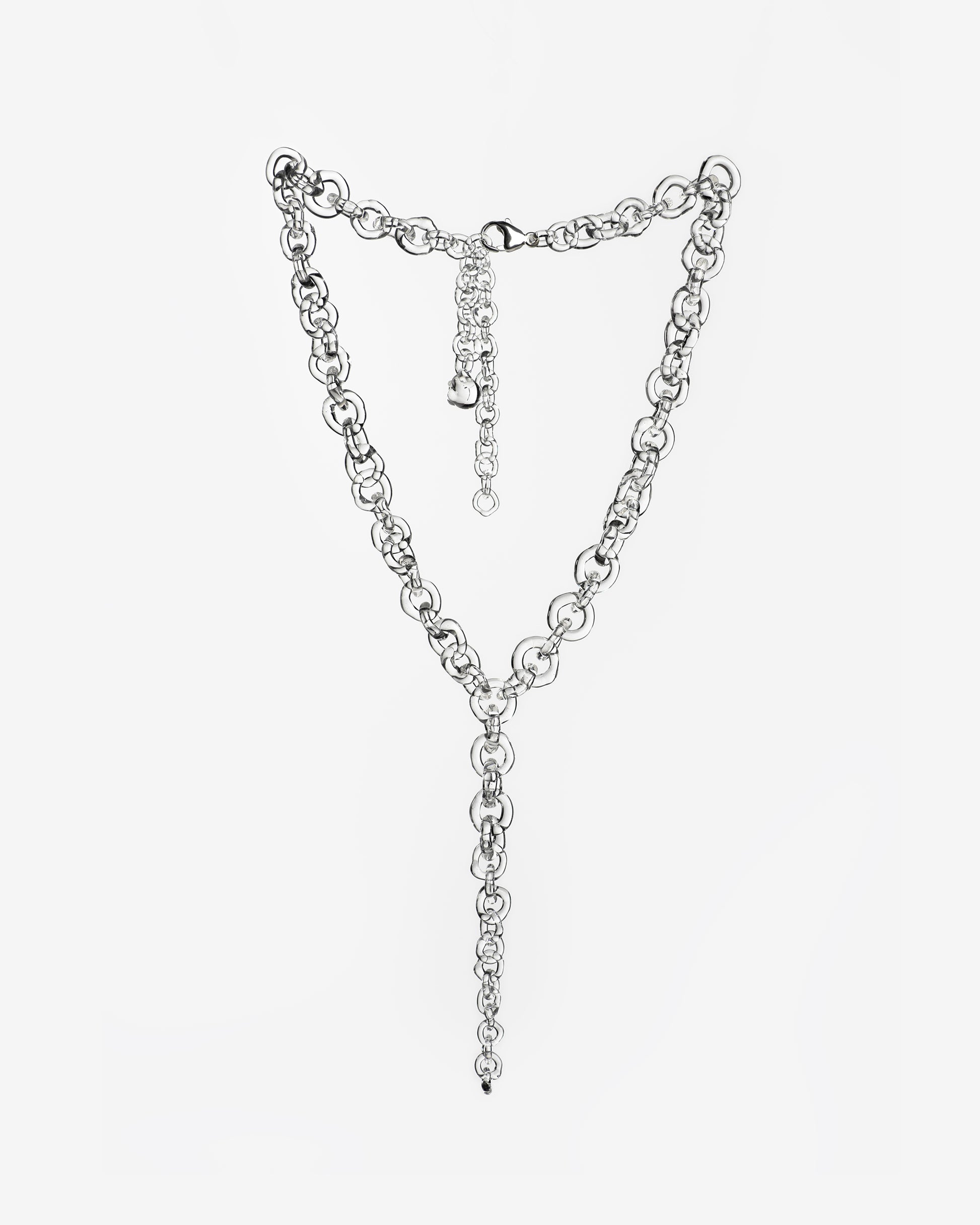 Bold transparent glass chain necklace with tapered drop detail, handmade from thick borosilicate glass links, finished with sterling silver clasp.