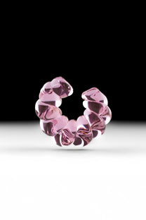 Twisted borosilicate glass ear cuff in pink color.