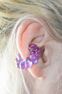 Purple borosilicate glass ear cuff worn on ear, handcrafted, secure without piercing.
