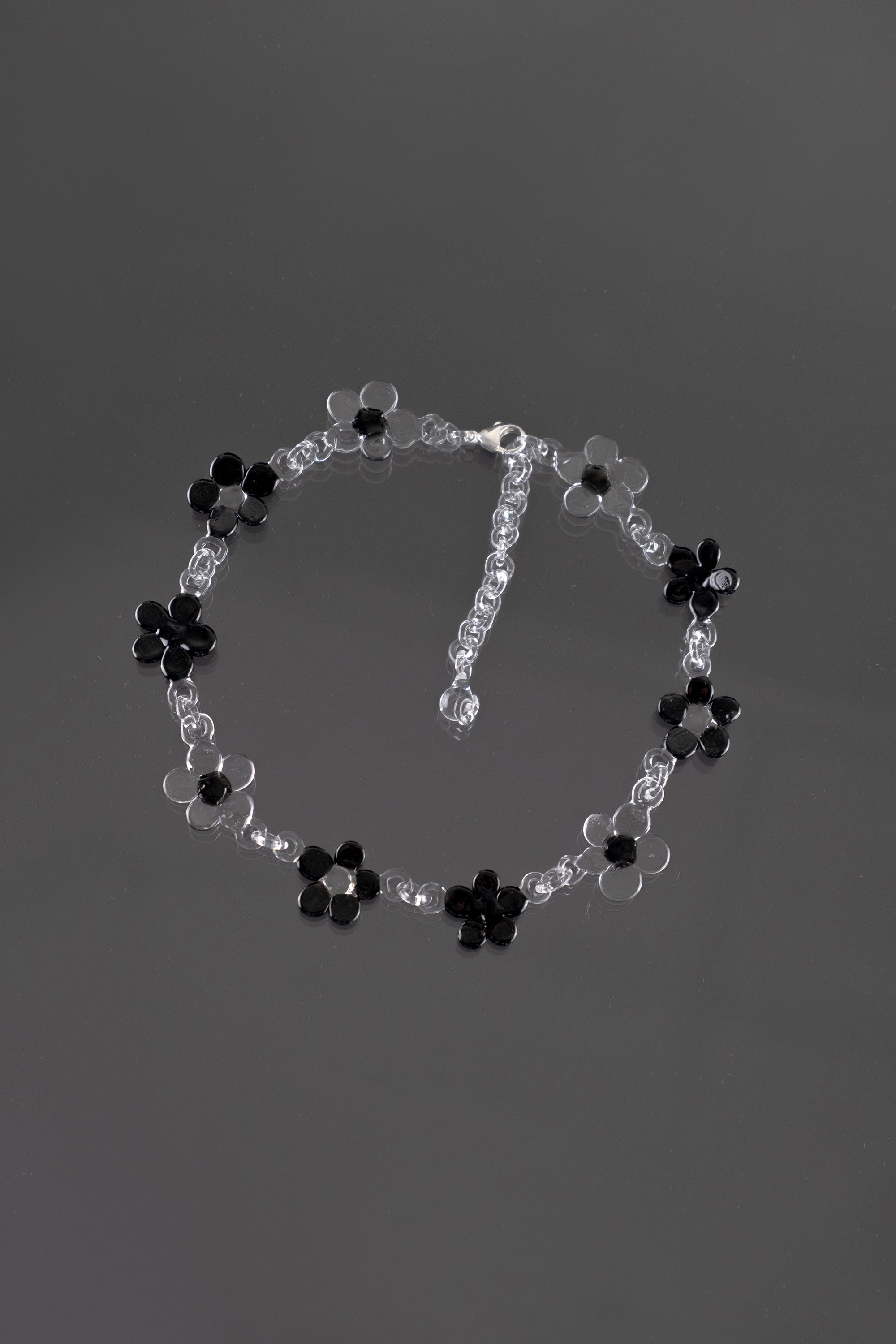 Black borosilicate glass flower choker necklace with silver clasp