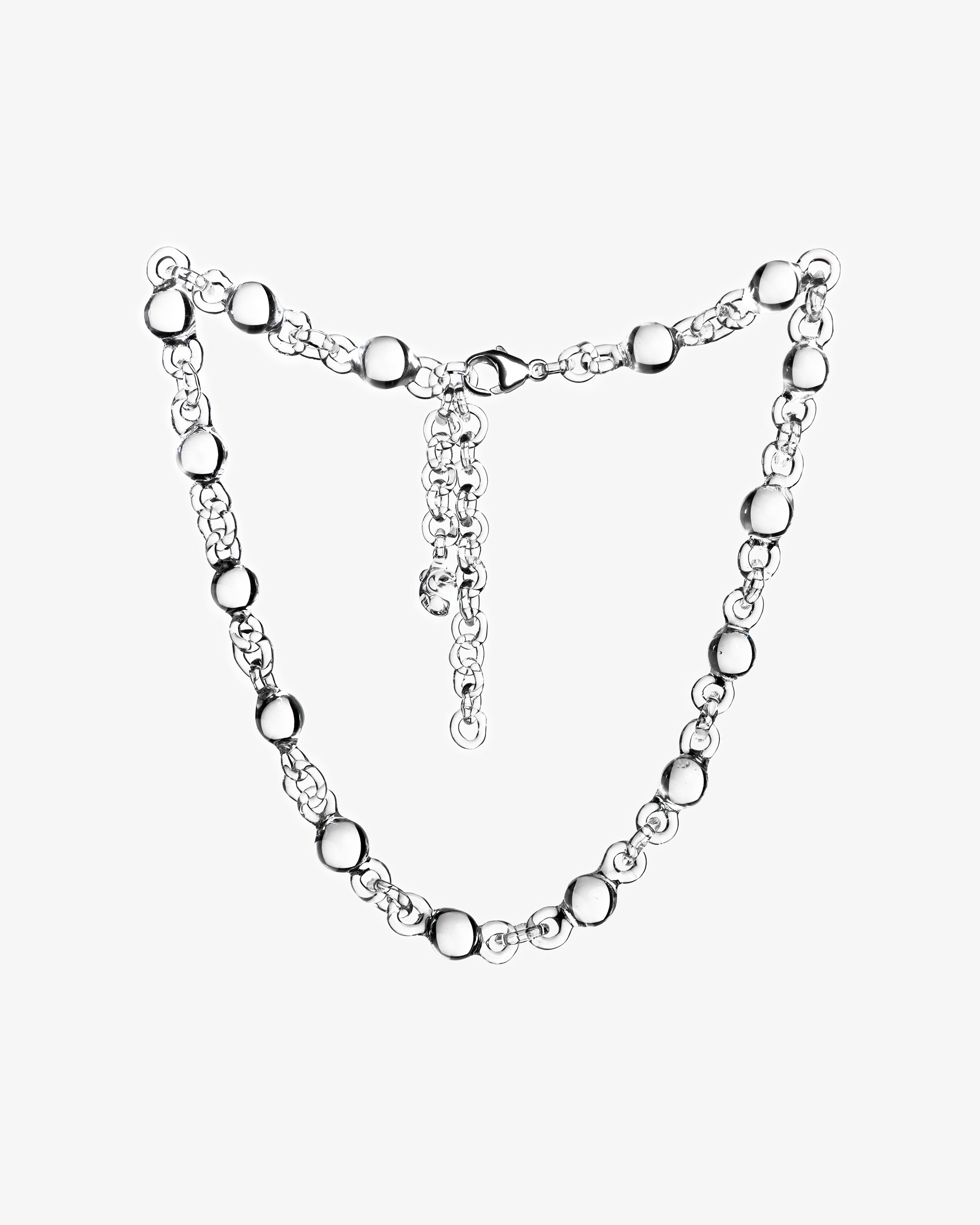 Transparent Orb Mini Necklace made from smaller solid borosilicate glass spheres, linked in a continuous chain, handmade jewelry.