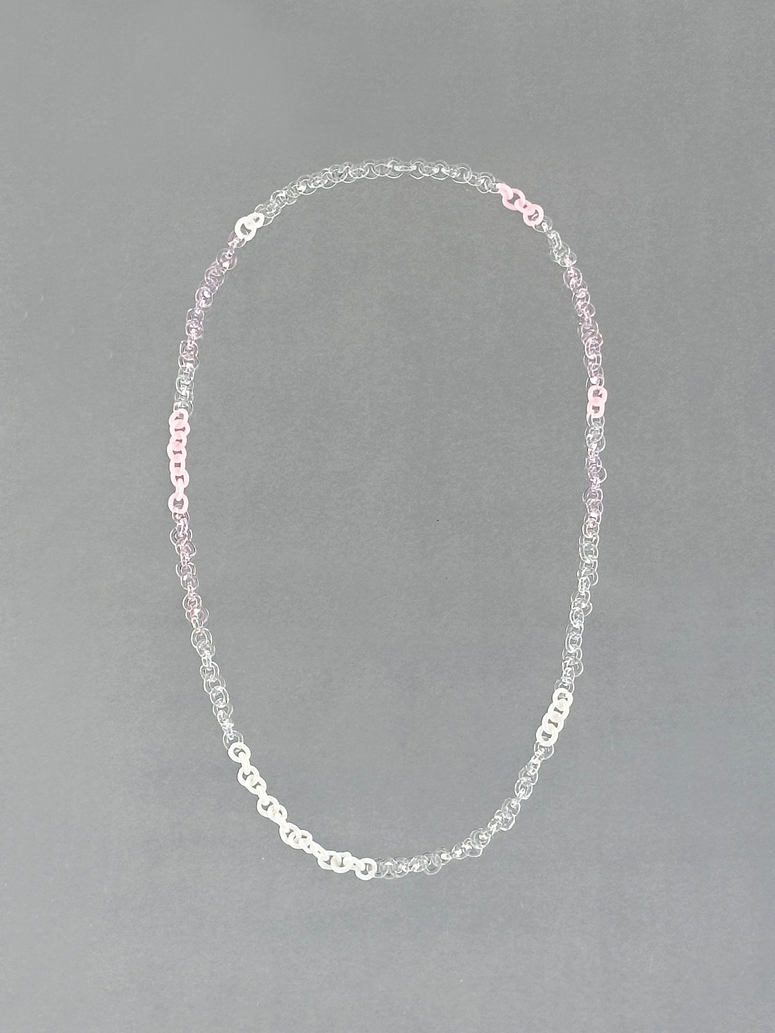 Handmade borosilicate glass Sequence Necklace in soft pink, opaque pink, white and transparent tones. A unique lightweight 75 cm necklace.