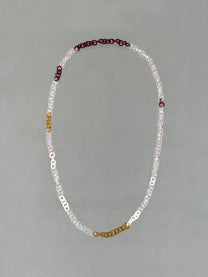 One-of-a-kind Sequence Necklace made from handmade borosilicate glass links in amber, red, pink, white and transparent colours.