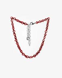 Red glass chain necklace made from thin borosilicate glass links, adjustable design with sterling silver clasp.